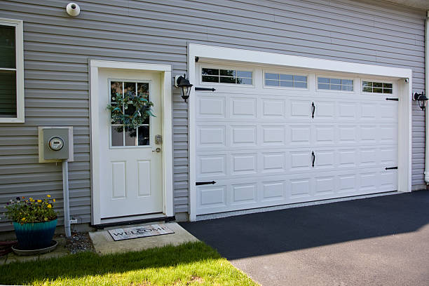 24/7 Emergency Garage Door Panel Replacement experts in Fredonia, KS